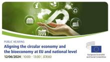 The EESC logo with the picture of a hand holding a circular arrow against a green background