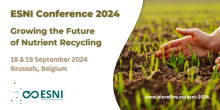 A picture of a hand brushing a crop growing in the soil and the words "ESNI Conference 2024; Growing the future of Nutrient recycling, 18-19 September 2024, Brussels"" 