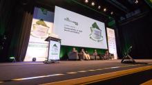 A banner on a stage with the words 'MeetingPack 2024 10 April, session 3, Sustainability in rigid packaging'