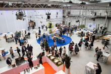 Photo of people in the expo area of a conference