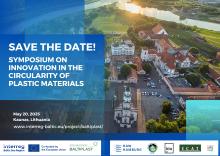 A photo of a city with white buildings and red roofs and the date, name and place of the event